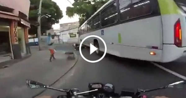 Speeding Motorcyclist Miraculously SURVIVES Being Run Over By A Bus At ...